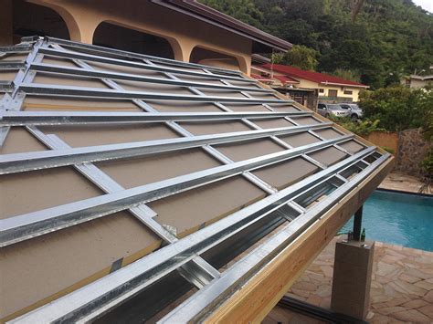 how to use metal roofing over deck from house|lightweight metal roof above patio.